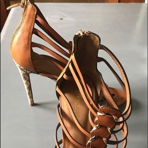 Coach snake skin heel  tan cage zip back heels.
